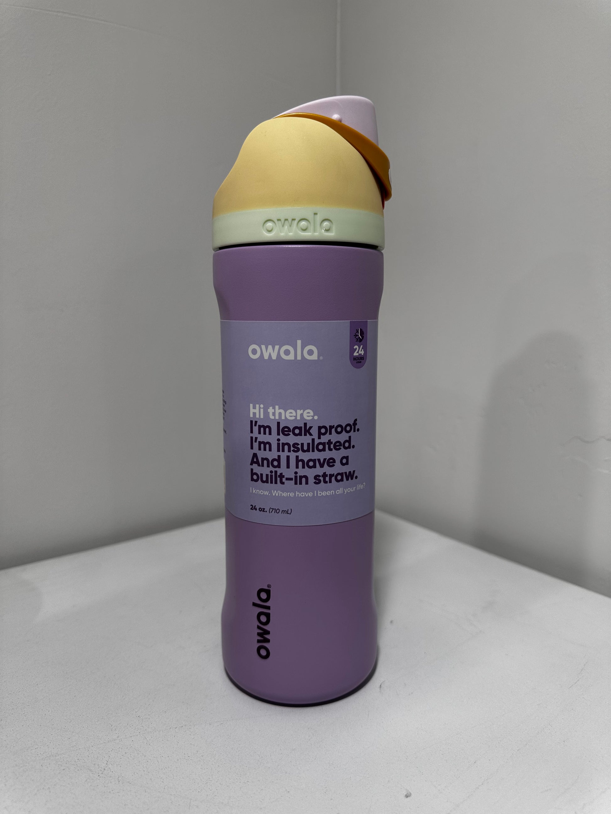 Owala Free Sip 24 oz Water Bottle, color is Purply Purple